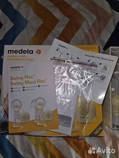 Молокоотсос medela swing flex