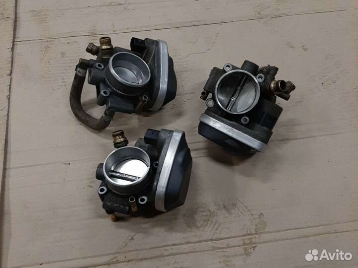 Дросельная заслонка Opel Astra H Vectra C