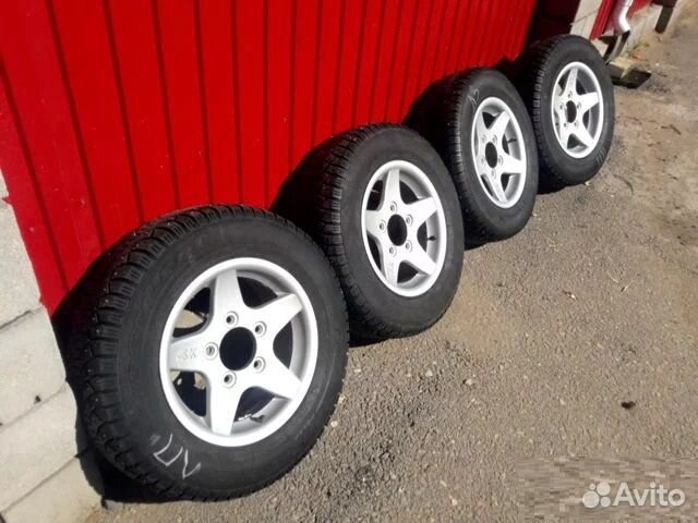 Шины диски литые нива. Кик ниагара 215 65 16. Нива на волговских дисках. Диски кик камелот r16. Резина на ниву р16.