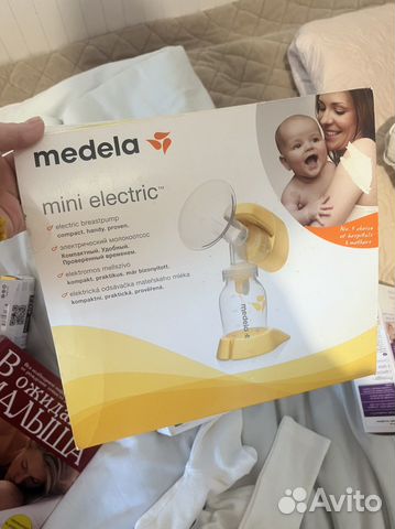 Молокоотсос medela электрический