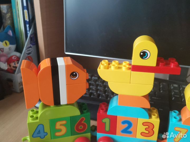 Lego duplo поезд и первые дивотные