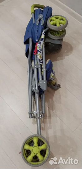 Прогулочная коляска трость