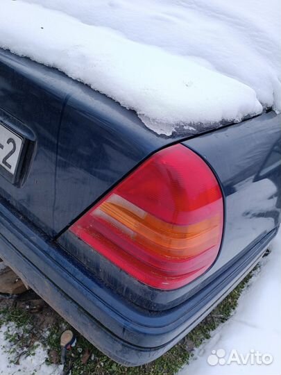 Фонарь фара mercedes w202