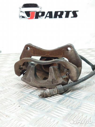 Суппорт тормозной передний Mitsubishi Lancer