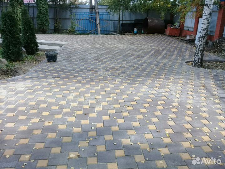 Укладка тротуарной плитки брусчатки