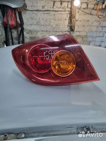 Фонарь задний левый мазда 3 седан вк1