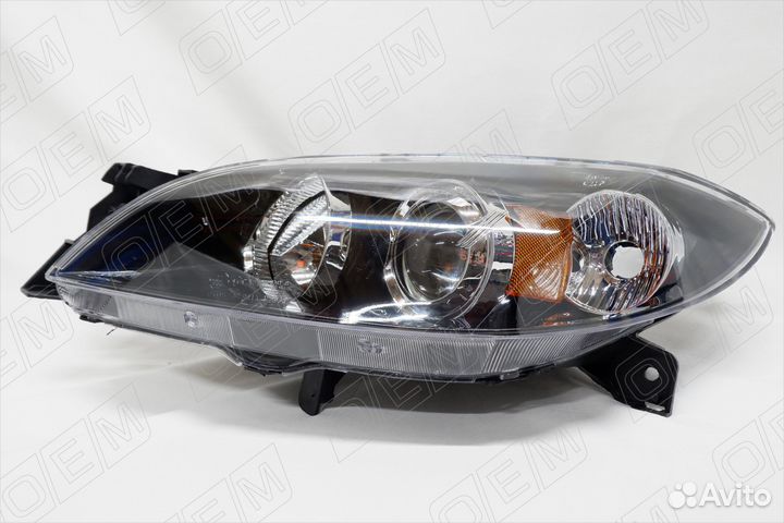 Фара левая Mazda 3 1 вк 2003-2009