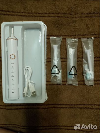 Электронная зубная щетка