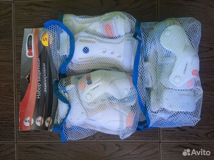 Роликовые коньки