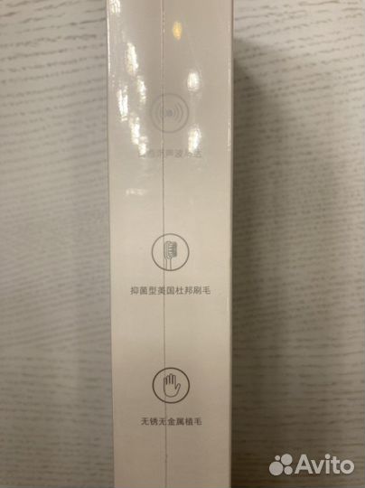 Электрическая зубная щетка