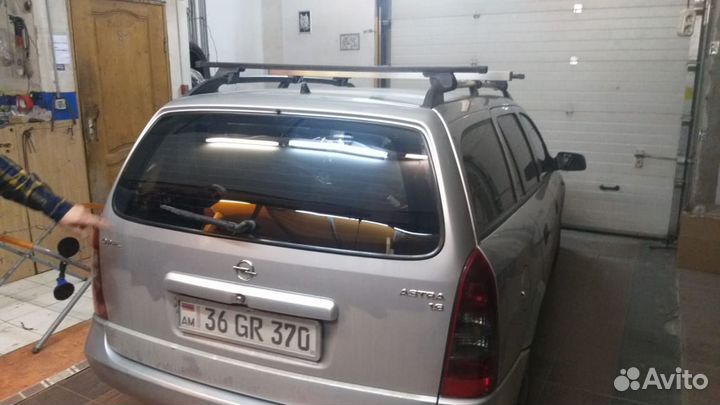 Стекло заднее на Opel Astra G