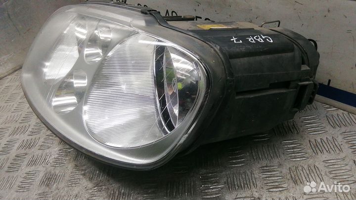 Фара Volkswagen Touran (2003-2010)