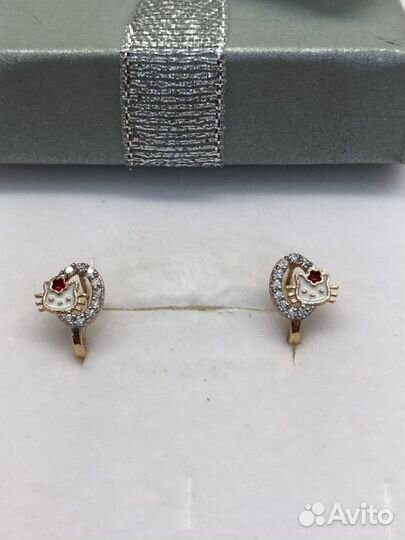 Серьги золотые