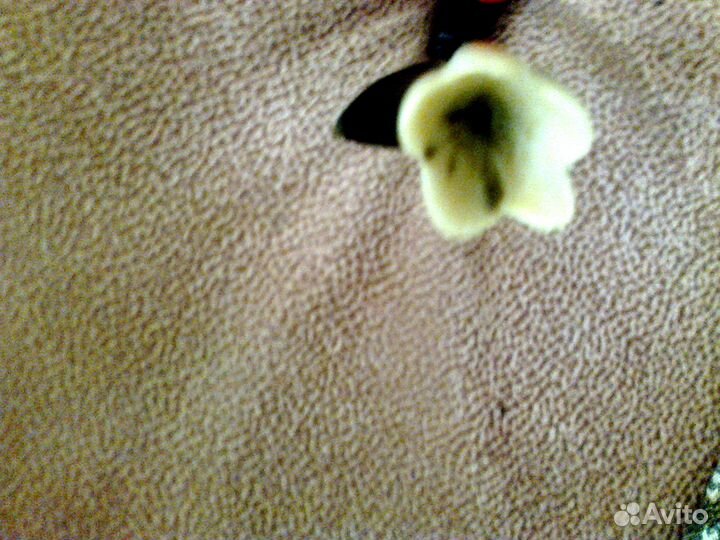 Цветок, вырезанный из кости