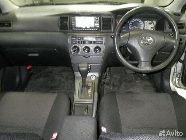 Тросик лючка бензобака Toyota Corolla fielder NZE121G