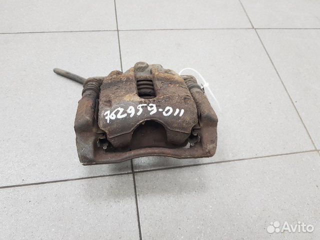 Суппорт тормозной передний правый Nissan Note