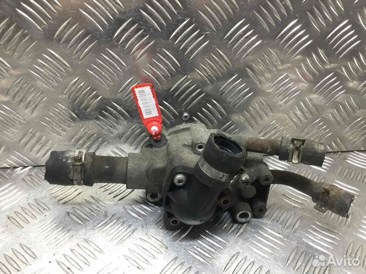 Корпус термостата Ниссан Альмера 130499f600 QG15DE