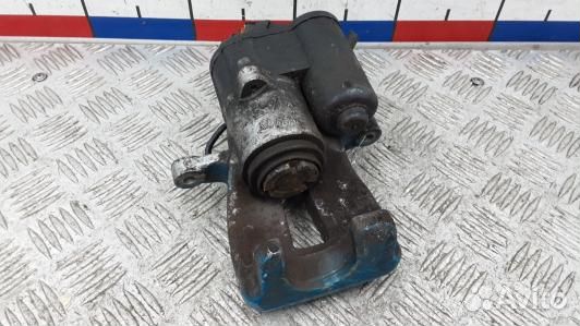 Суппорт тормозной задний левый volkswagen passat B