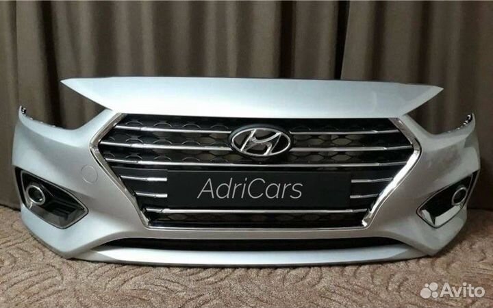 Бампер передний серебристый Hyundai Solaris 2