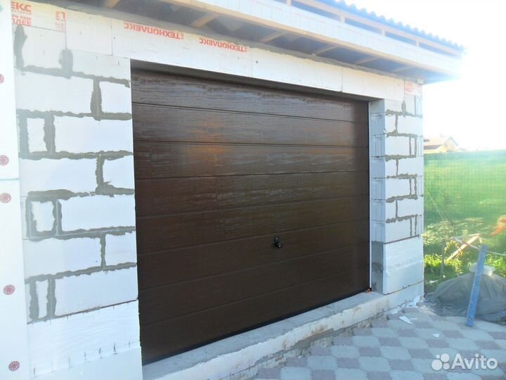 Подъемно секционные ворота