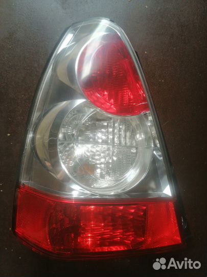 Фонарь задний левый Субару SG