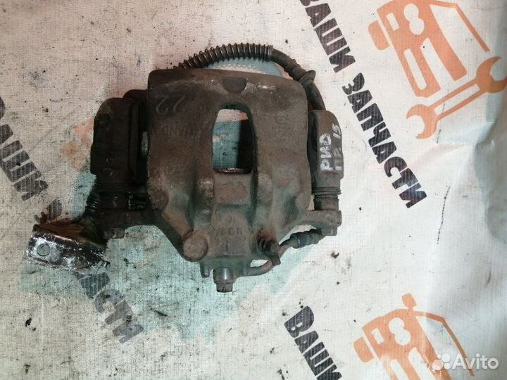 Суппорт тормозной передний правый Kia Rio 3