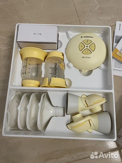 Молокоотсос medela swing maxi flex