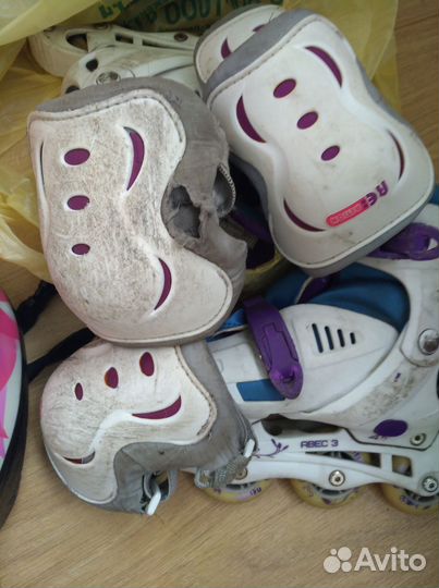 Роликовые коньки