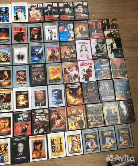 DVD диски с фильмами (примерно 105шт.)