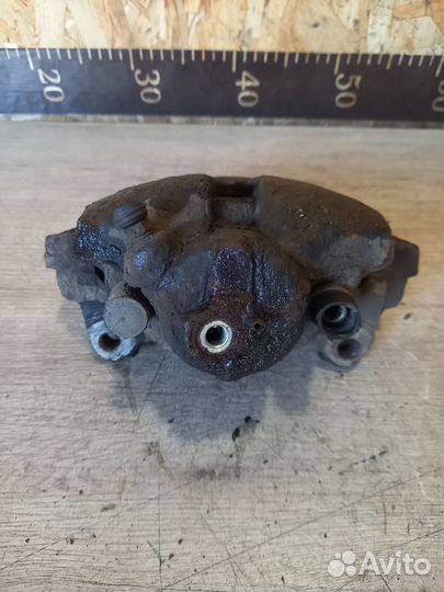 Суппорт тормозной передний левый Skoda Octavia A5