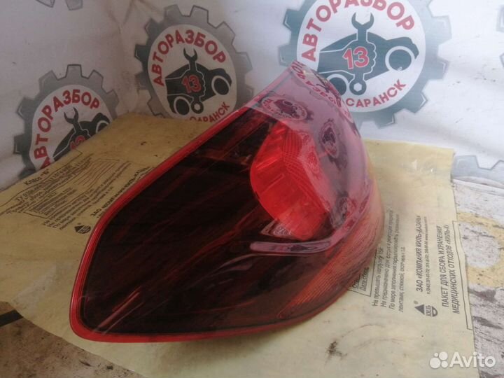 Фонарь левый Opel Astra J универсал 2013