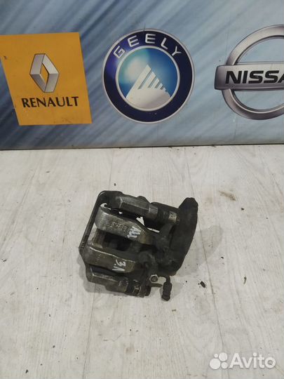 Суппорт тормозной задний Geely atlas Лев