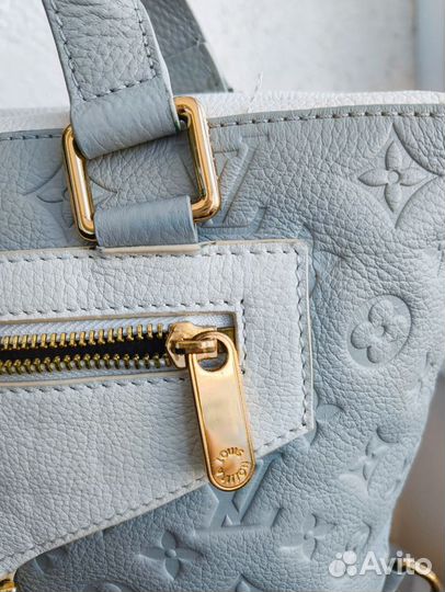 Кожаная сумка с тиснением Louis Vuitton