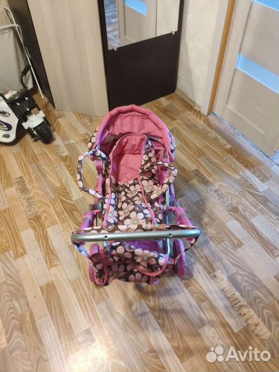 Детская игрушечная коляска