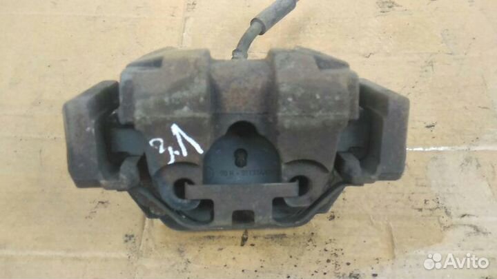 Суппорт тормозной задний левый Bmw 7-Series F02