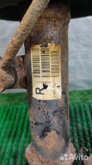 Стойка амортизатора передняя правая Suzuki Swift