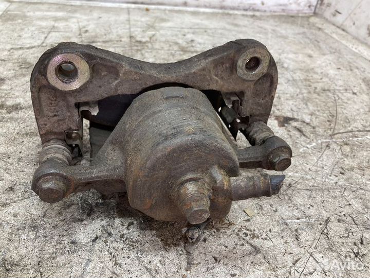 Суппорт тормозной передний левый Hyundai Sonata