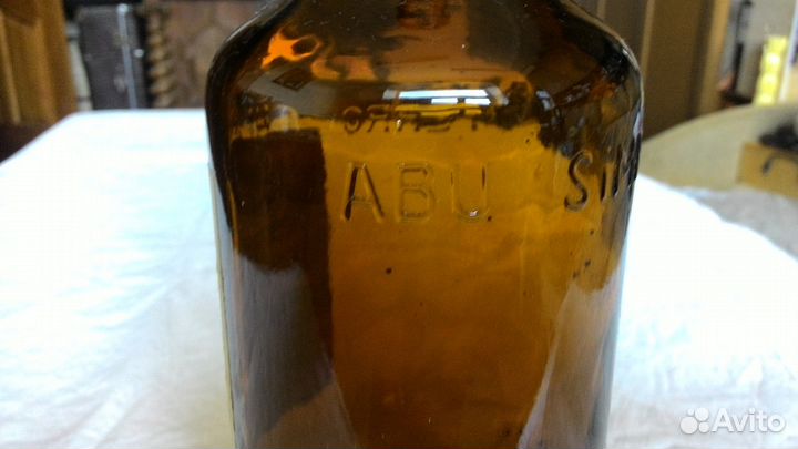 Бутылка из под бальзама ABU simbol