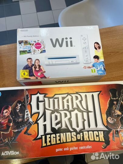 Продам Nintendo Wii + Guitar Hero 3 + 5 игр