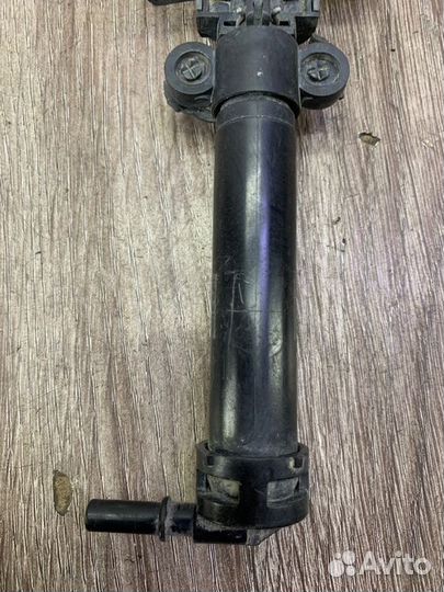 Форсунка омывателя фар передняя левая Opel Antara