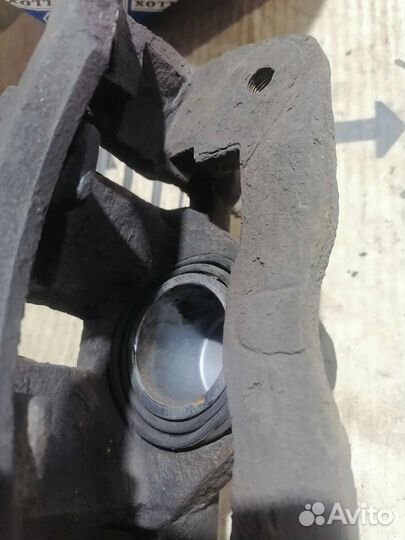 Суппорт передний KIA Spektra левый