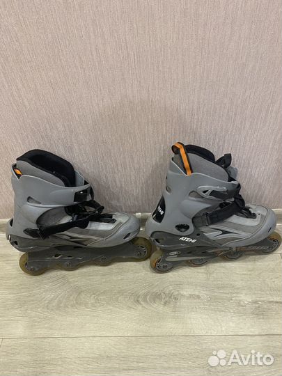 Роликовые коньки