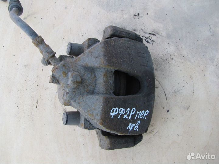 Суппорт передний левый Ford Focus 2 рест