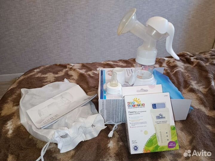 Молокоотсос ручной + пакеты для молока + владыши