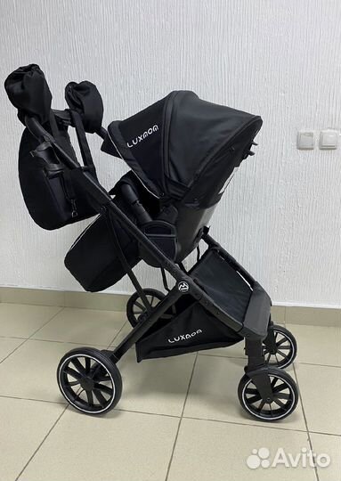 Прогулочная коляска с реверсивным блоком