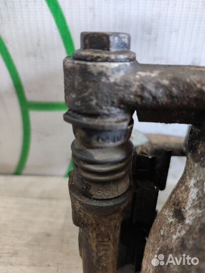 Суппорт задний левый Toyota Avensis T25 2AZ-FSE