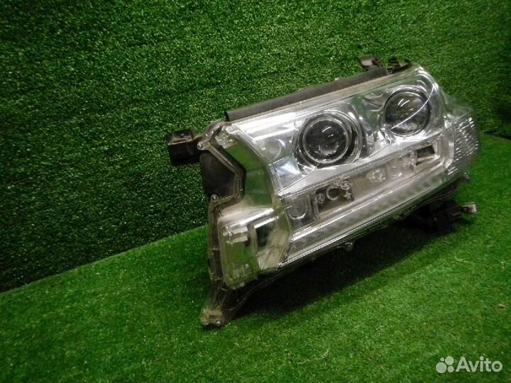 Фара левая Toyota Land Cruiser