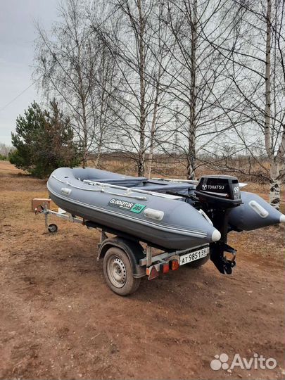 Лодка гладиатор е380 мотор Tohatsu M9.9(15) +прице