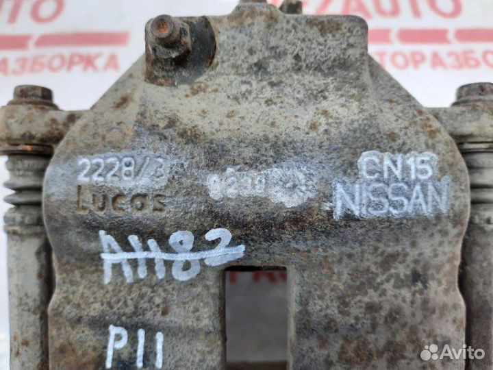 Суппорт тормозной передний правый Nissan Primera