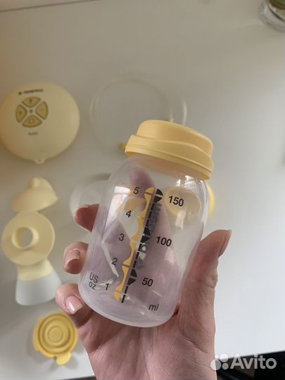 Молокоотсос medela электрический